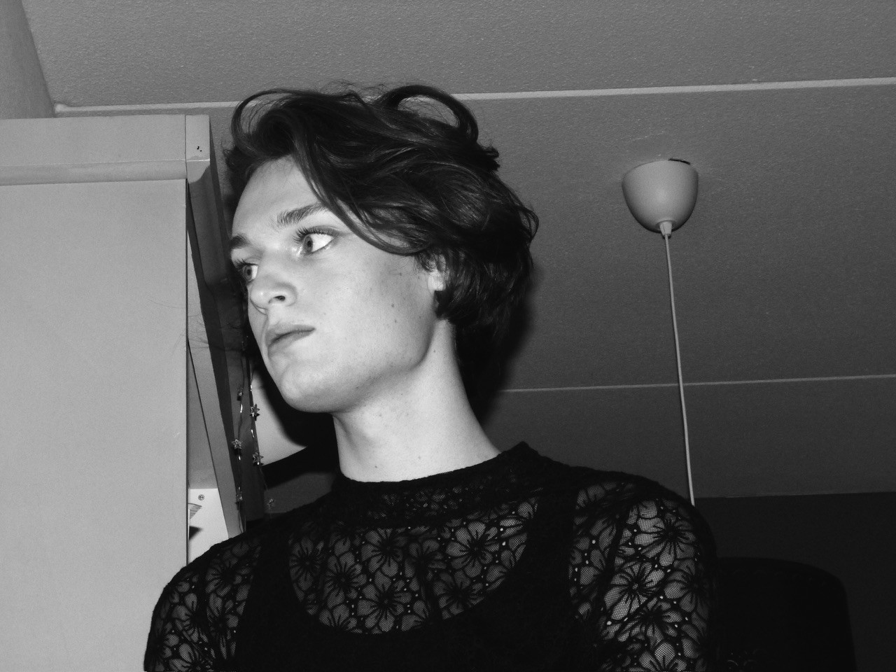 Black and white portrait of me looking off to the side.