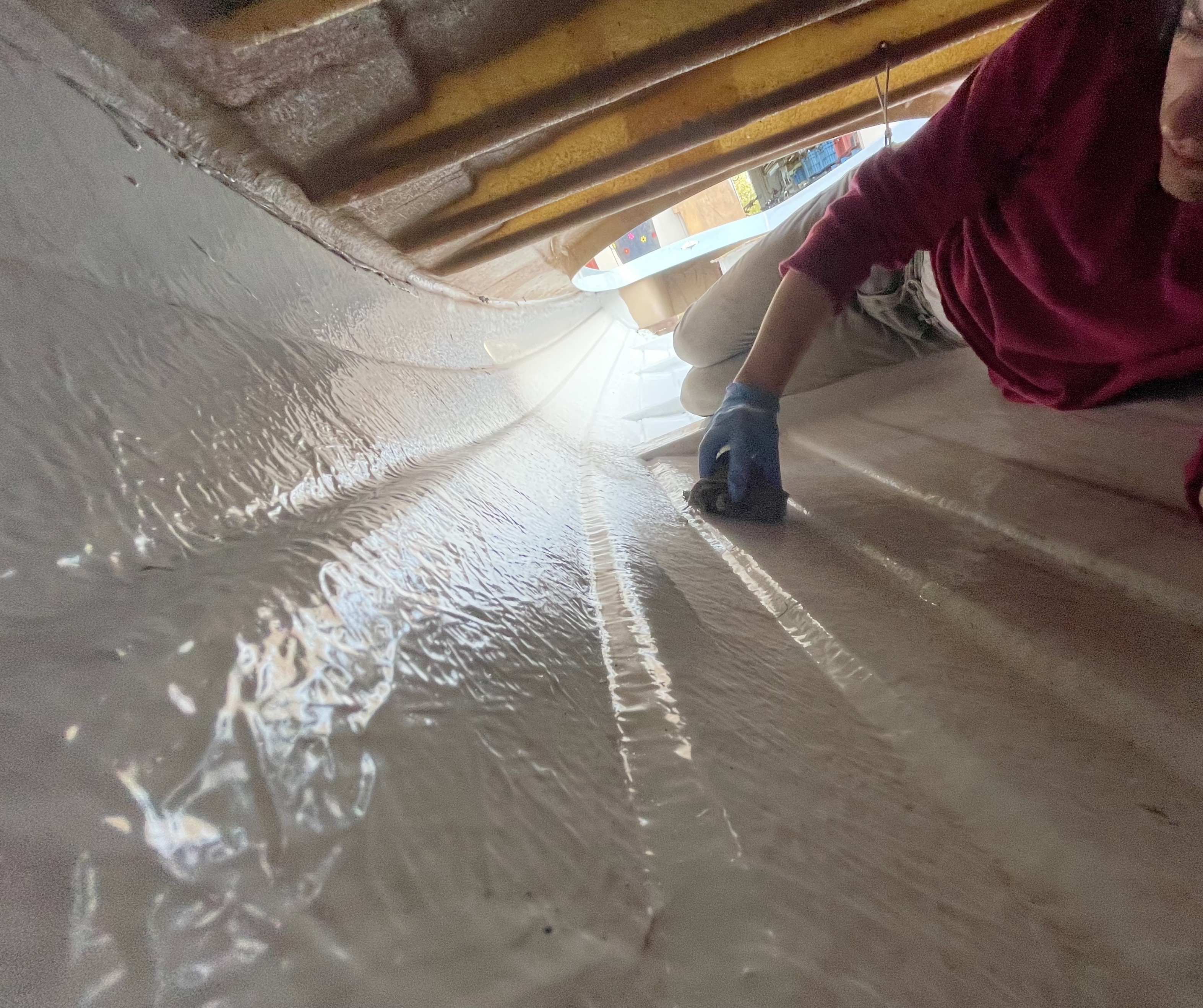 picture of me cleaning the inside of the hull from up in the front cavity