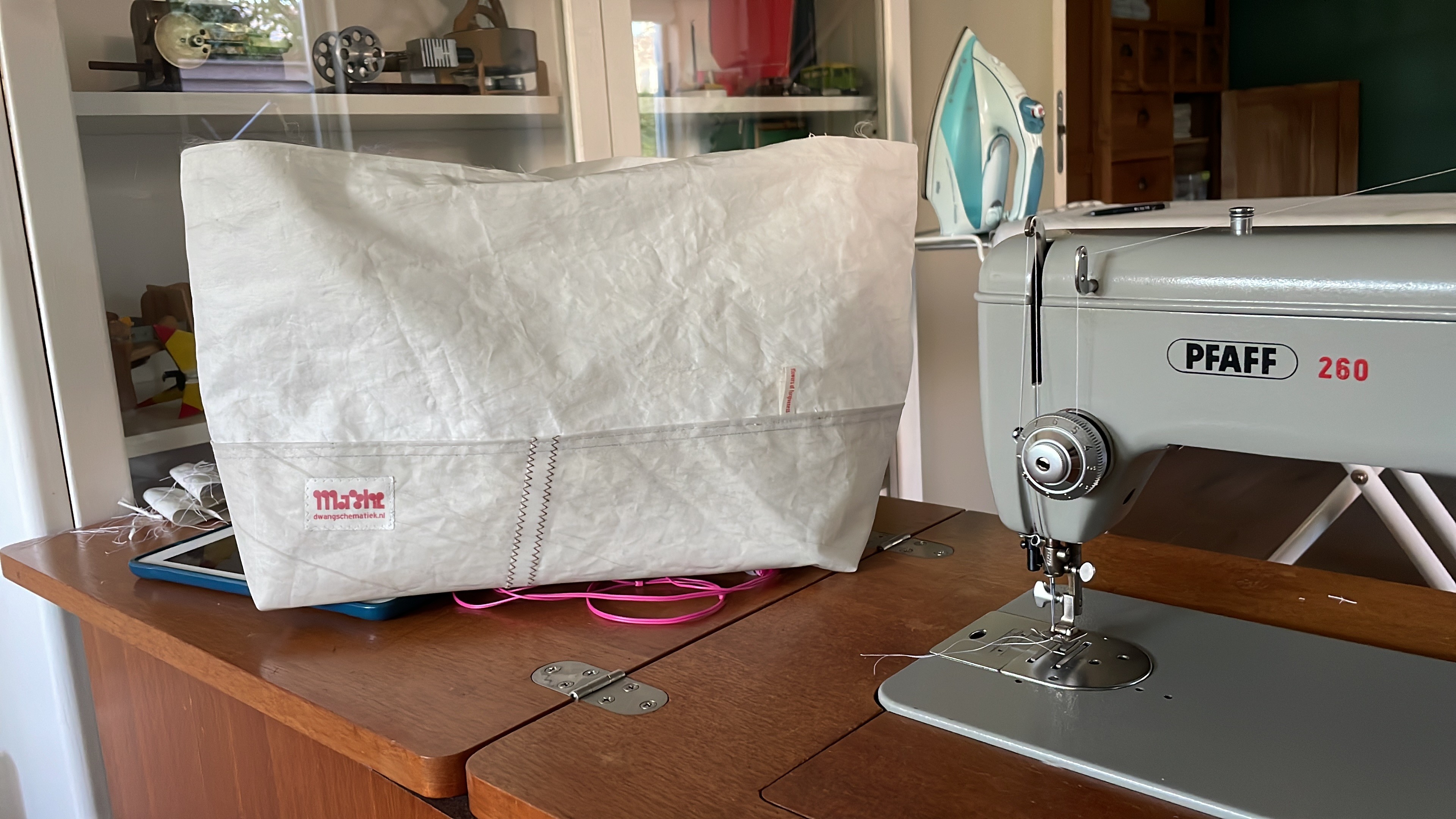 In progress. The main bag stands, no top part attached.