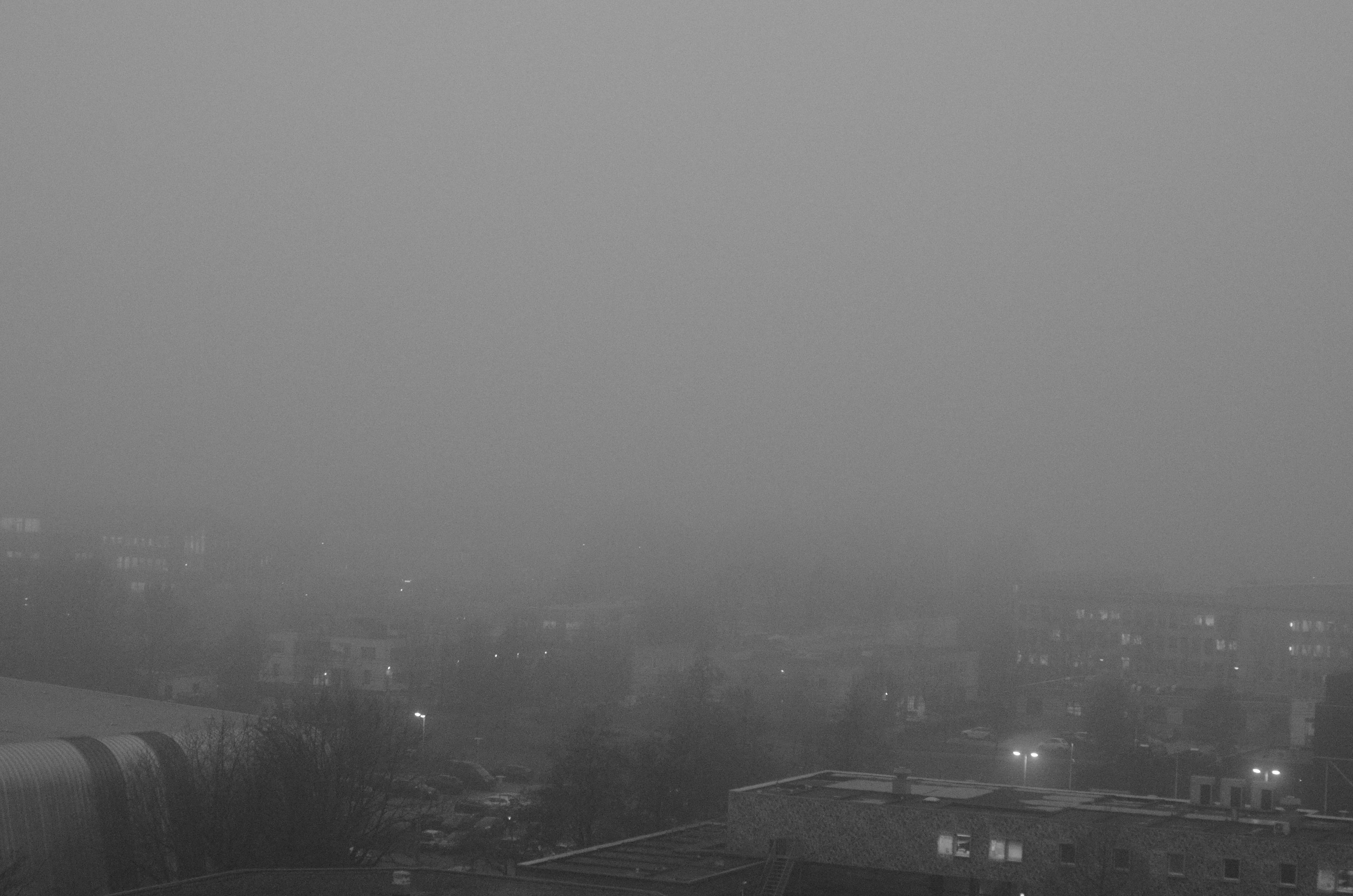 fog over the campus in noisy black and white