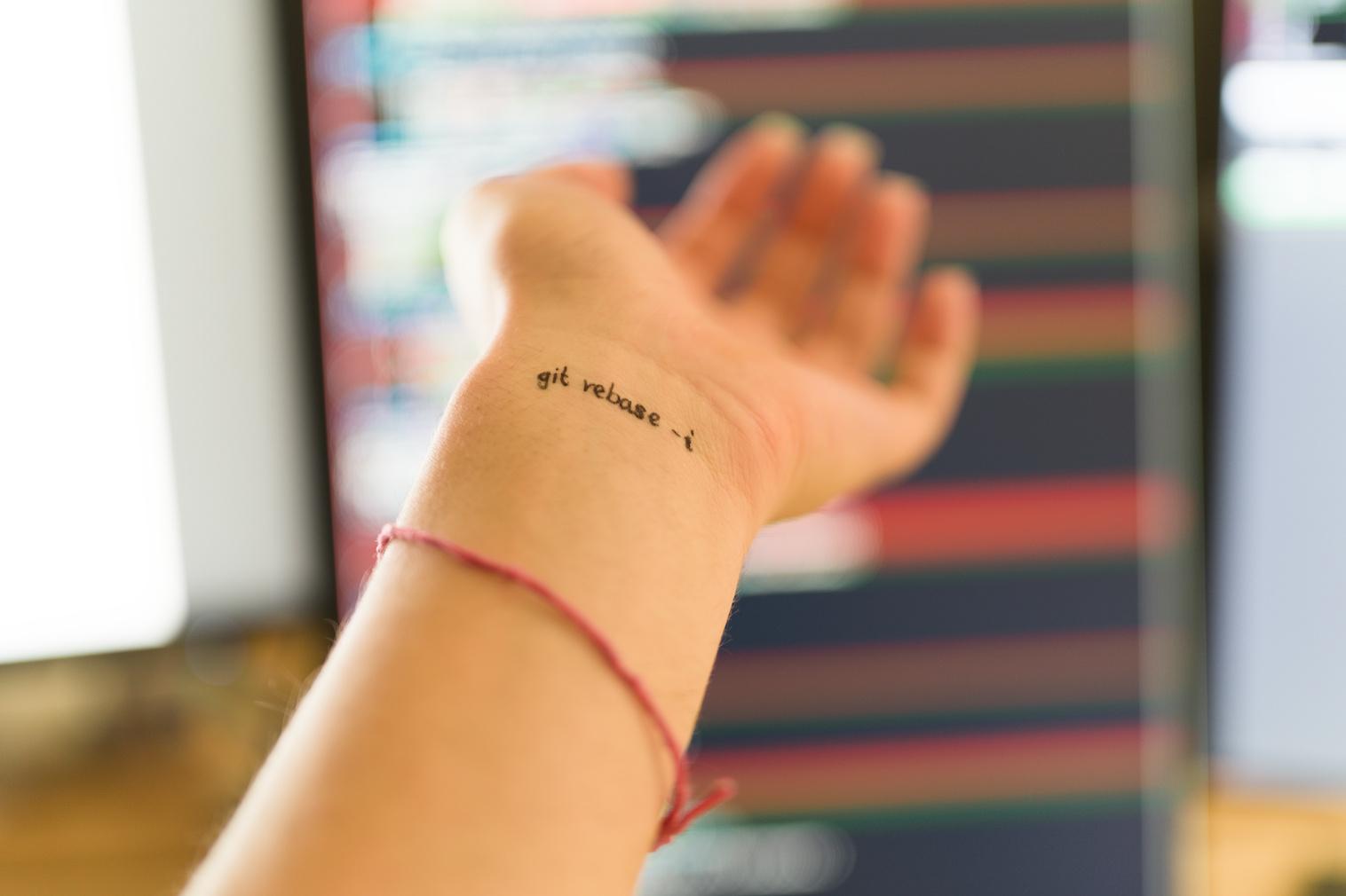 On the under side of my wrist black handwritten letters say "git rebase -i".