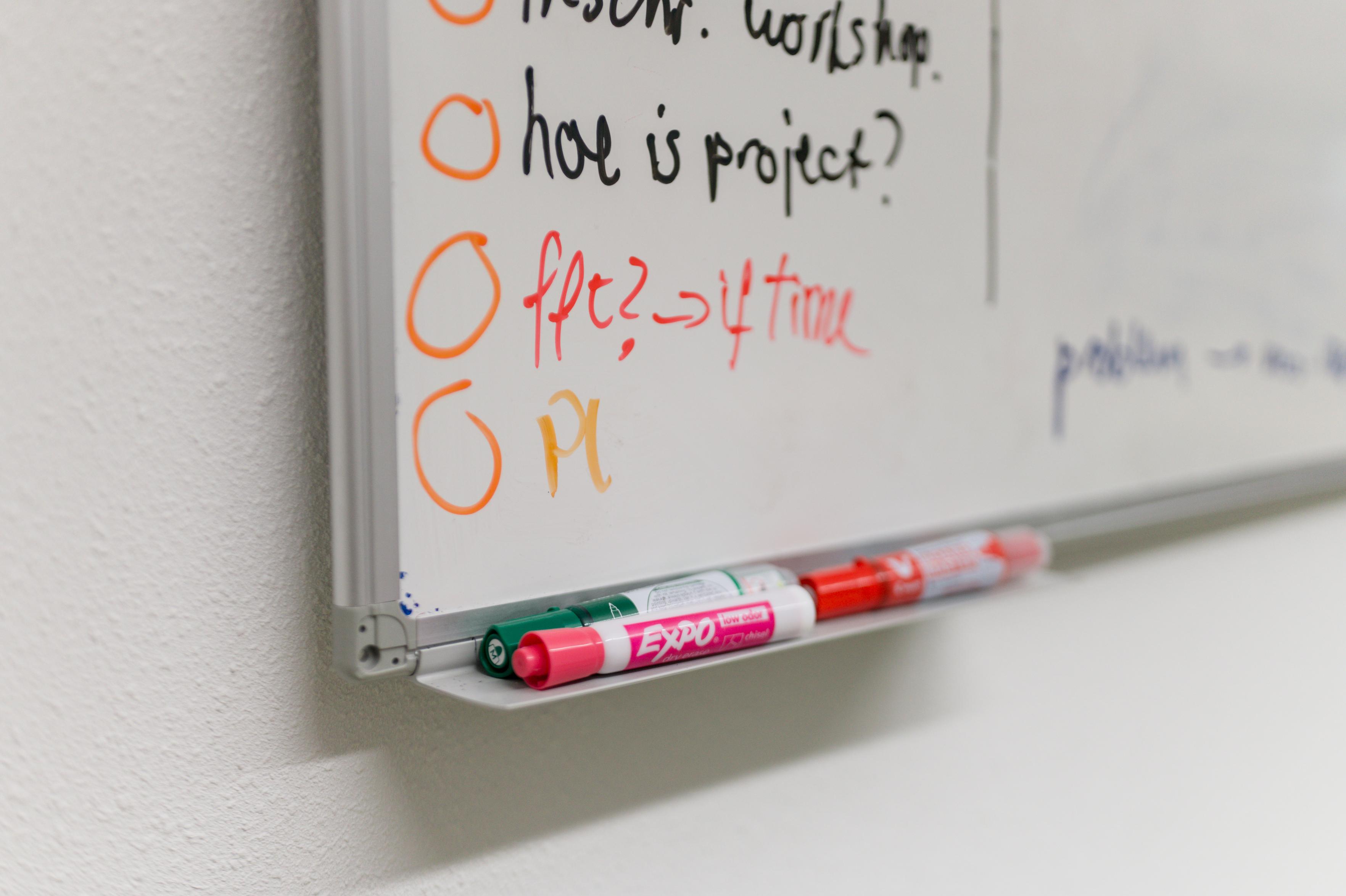 My markers at the whiteboard.